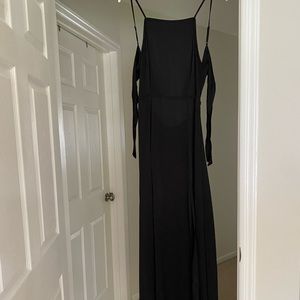 Express black backless dress. size small. zipper in back has straps and sleeves.